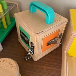 Lovevery Wooden Activity Box with Teal Handle and Orange Panel